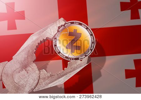 Zcash (zec) Coin Being Squeezed In Vice On Georgia Flag Background; Concept Of Zcash Cryptocurrency 