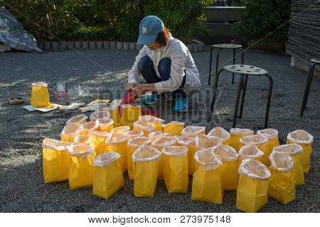 Fukuoka, Japan - October 20, 2018: Preparing colorful paper lanterns for the Hakata Tomyo Watching festival at  Shofukuji temple grounds
