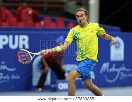 KUALA LUMPUR - SEP 27: Alexandr Dolgopolov spielt seine Runde 2 Match auf der ATP Tour Malaysian Open 20