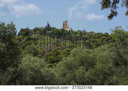 Monument Of Philopappos Sitting On The Top Of A Hill, In Athens, Greece