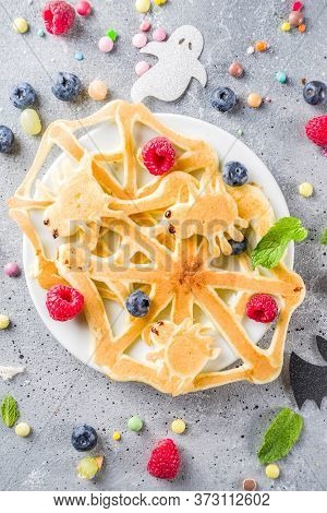 Halloween Kids Food Treat. Funny Pancakes - Ghosts, Jack O Lantern Pumpkins, Spider Webs. Breakfast 