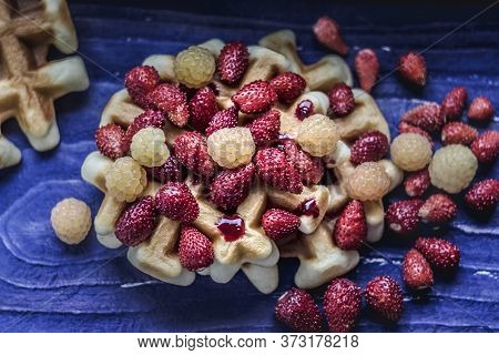 Homemade Waffles With Berries On Blue Wooden Background. Delicious, Nutritious, Fantastic Breakfast 