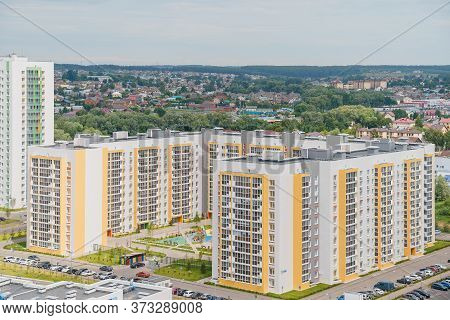 Aerial Panoramic View Dense Of Hdb Apartment Buildings At Midday. High Rises Flat Complex Grass Cour