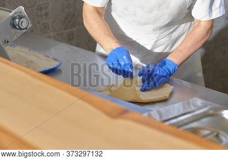 Chef Cooking In An Open Kitchen Vertuta Or Placinta With Cottage Cheese And Cheese . Traditional Mol