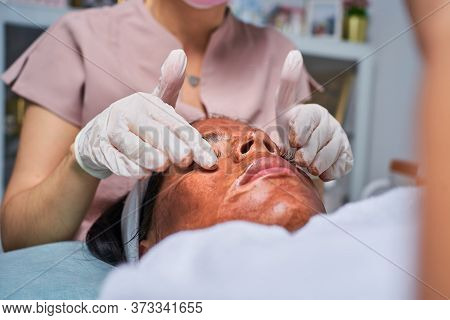 Face Skin Care. Close-up Of Woman Getting Facial Hydro Microdermabrasion Peeling Treatment At Cosmet