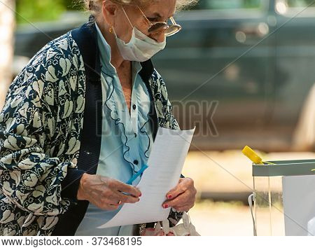 An Elderly Woman At A Street Polling Station To Vote On Amendments To The Constitution Of The Russia