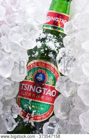 Two Bottles Of Tsingtao Beer In Crushed Ice