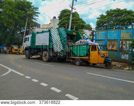 Bangalore, Karnataka/india-jun 26 2020: Closeup Of Bbmp Garbage Collecting Lorry And Auto Parking On