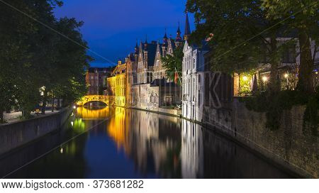 Night View Of Steenhouwersdijk Canal, Bruges, Belgium