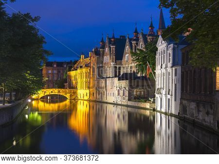 Night View Of Steenhouwersdijk Canal, Bruges, Belgium