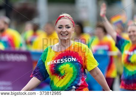 Cincinnati, Ohio, Usa - June 22, 2019: The Cincinnati Pride Parade, Woman Smiles For The Camera Wear