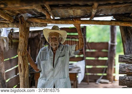 El Chorrito, Tamaulipas, Mexico, July 2, 2019: Mexican Senior, Welcomes Town Visitors Into His Humbl