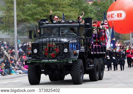 Houston, Texas, Usa - November 28, 2019: H-e-b Thanksgiving Day Parade, An M939 Truck, Of The High W
