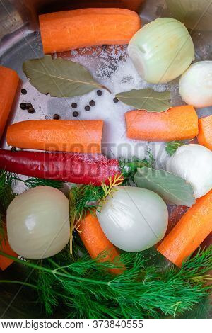 Bay Leaf And In A Metal Pan With Pieces Of Chicken And Vegetables To Boil The Broth