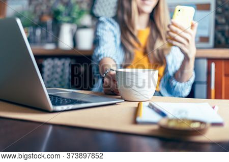 Business Woman Having A Facetime Video Call. Happy And Smiling Girl Working From Home Office Kithcen