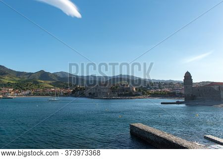 Beautiful Autumn Day In The Tourist City Of Colliure In Occitania Whit On Back The Church Of Notre D