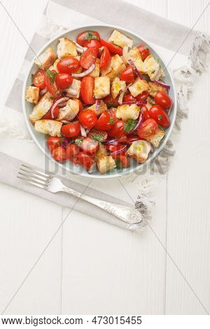 Acquasala Italian Puglian Bread Salad With Cherry Tomato Closeup On The Plate On The Table. Vertical