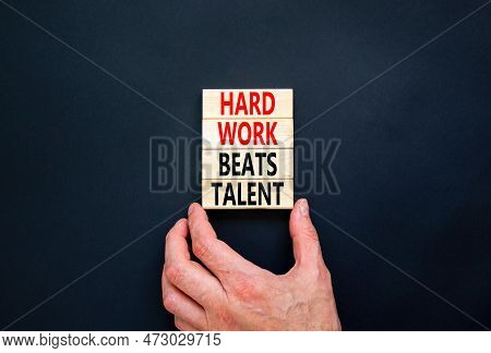 Hard Work Beats Talent Symbol. Concept Words Hard Work Beats Talent On Wooden Block. Beautiful Black