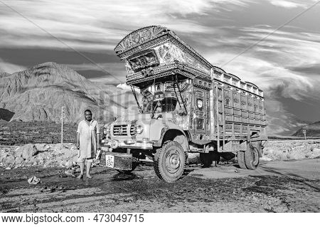 Gilgit, Pakistan - August 6, 1987: Proud Truck Driver Presents His Painted Truck At The Karacorum Hi
