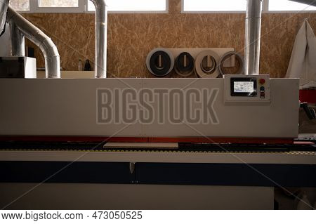 Single Sided Automatic Edge Banders On Furniture Factory, Close Up. Edge Banding Machine Making Furn