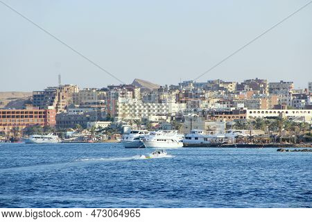 Hurghada - Egypt. 02 August 2018: View Of Embankment Of Hurghada With Moored Yachts, Ships And Beaut