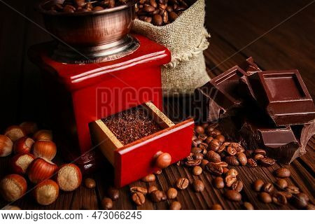A Coffee Grinder And Coffee Background A