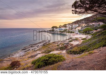 View At Sunset Over Sandy Beach Of Little Village Seccheto At Elba