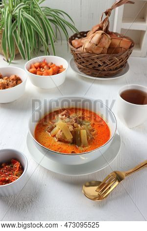 Chicken Curry With Chickpeas And Chayote On A White Bowl