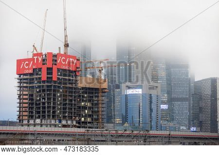 Moscow, Russia - 11 November, 2022: High-rise Construction Against The Backdrop Of Moscow City Skysc