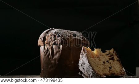 Panettone With Dried Fruits On Black Background, Selective Focus