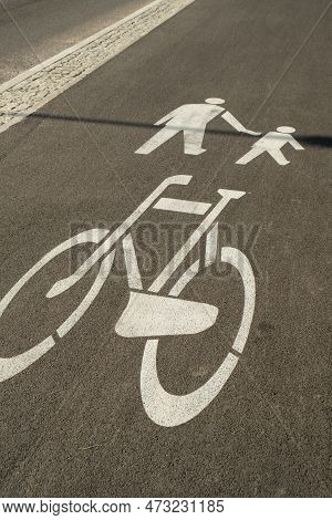 Cyclist And Pedestrian Route Zone Sharing Sign On A Street. Painted Street Asphalt Bicycle Lane Sign
