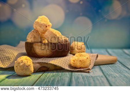 Handmade Chipa Served In A Charming Wooden Vessel