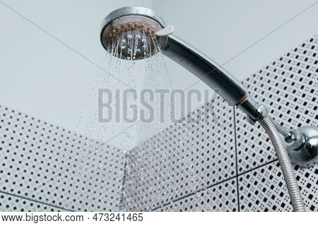 Silver Shower Head With Limescales. Shower Damaged From Water Scale. Hard Water Deposit All Around T
