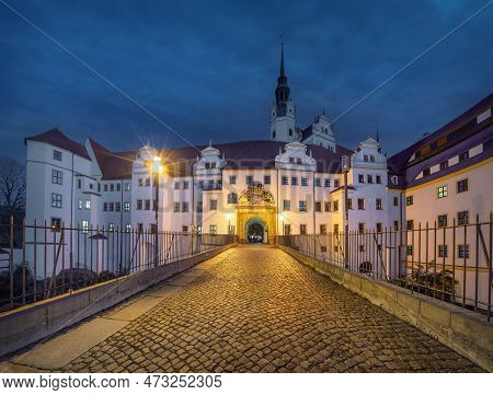 Entrance Gate Of Hartenfels Castle (schloss Hartenfels) At Dusk In Torgau, Germany