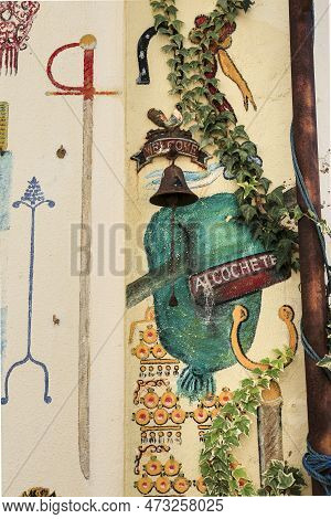 Alcochete, Lisbon, Portugal- November 21, 2022: Rusty Bell On Typical Facade In Alcochete Town, Lisb