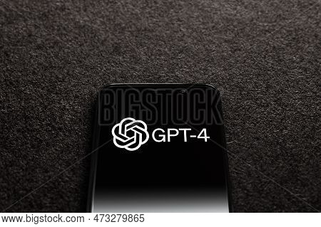 Gpt-4 Logo On Screen Smartphone On Black Textured Background. Gpt-4 Is A Chatbot By Openai. Moscow, 