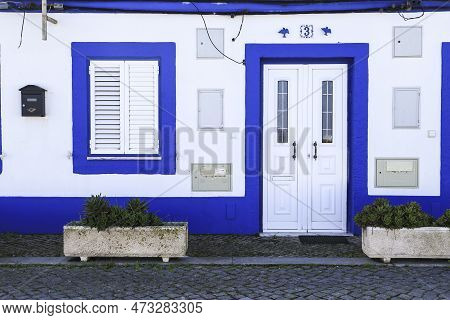 Alcochete, Lisbon, Portugal- October 21, 2022: Typical Whitewashed Facade In Alcochete Town, Lisbon