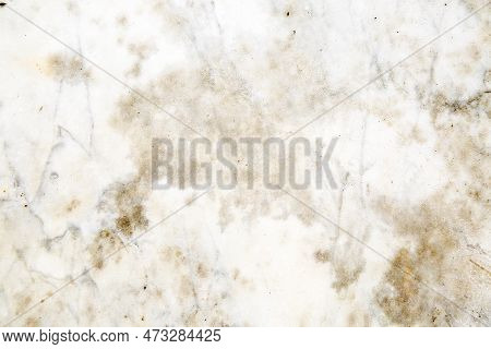 Aged Marble Wall With Scratches And Black Points. Background And Wallpaper Picture With Copy Space. 