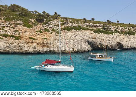 Turquoise Waters In Mallorca. Pilota Cove. Mediterranean Coastline. Spain