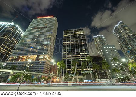 Downtown District Of Of Miami Brickell In Florida, Usa. Brightly Illuminated High Skyscraper Buildin