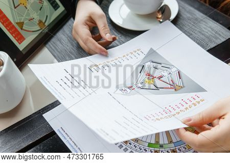 A Beautiful Girl In A White Nightgown At Home, Surrounded By Spring Flowers On A Large Bed. A Room D