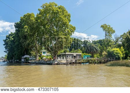 Tigre, Argentina - 7 February 2023: Isla Bruma Bar And Restaurant Landing Stage And Tables On Parana