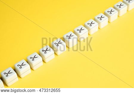 Line Of Scissors On Blocks. The Concept Of The Cutting Line. Reducing Budget And Spending. Cut Off T