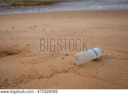 The Plastic Bottle Waste On The Beach, Bad Environment From Human, Dirty Sand And Sea On The Beach O