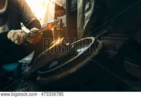 Close Up Hand Heavy Industrial Worker Is Working On Metal Work Factory Process By Cutting Sheet Stee