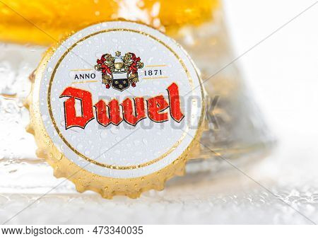 London, Uk - December 22, 2022: Beer Cap With Dew From Duvel Beer Bottle On White.