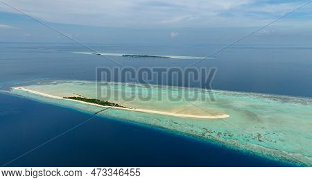 Aerial View Of Tropical Island On The Atoll And Coral Reef. Timba Timba Islet. Tun Sakaran Marine Pa