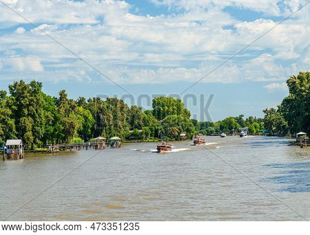 Mahogany Boats Ferry Passengers From The Port To Their Homes And Landing Stages On Parana Delta In A