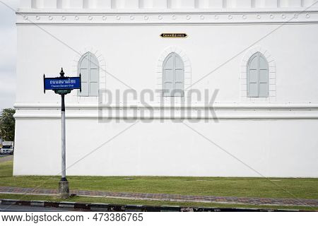 Bangkok, Thailand- 13 Feb, 2023: Thanon Sanam Chai Road Sign And White Wall Of The Grand Palace Bang
