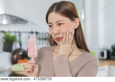Closing Eyes Asian Young Woman Touching Cheek, Face Expression From Toothache, Tooth Decay Or Sensit